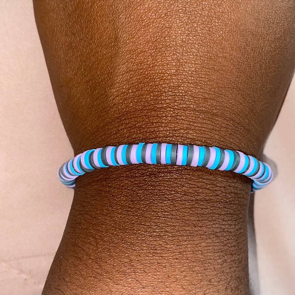 light, light blue, and dark gray bracelet